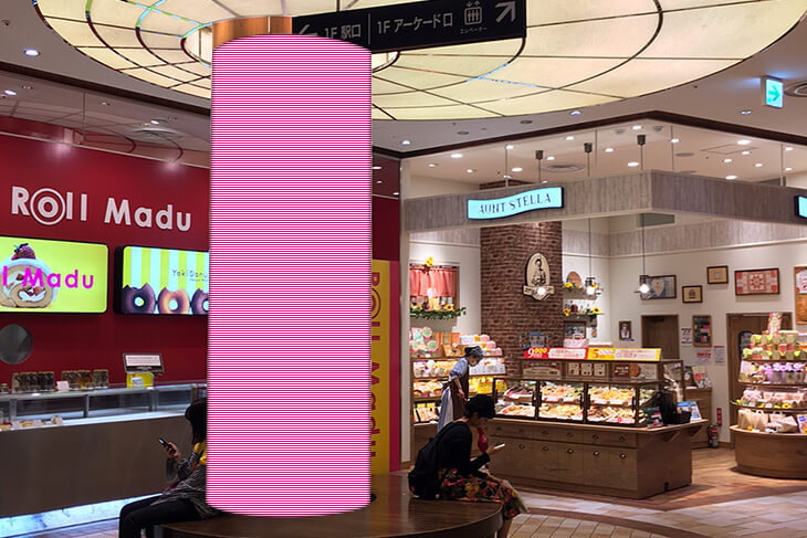本館・1F昇りエスカレーター前柱シート巻